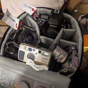 Nikon camera contact camera and a Kyocera and a canon camera